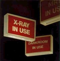 LIGHTED INFORMATION SIGNS -X-RAY IN USE